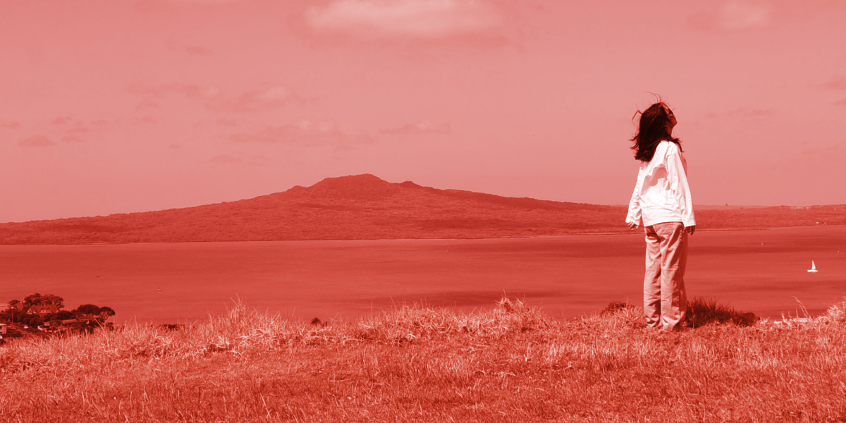 Woman looking up over Rangitoto